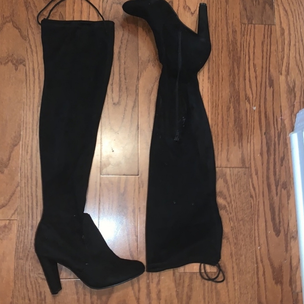 Above the knee "hooker boots". These are so fun and sexy.  Wore a couple times